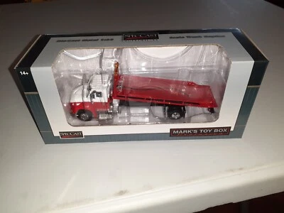 NIB 1/64 Red White International IH 8600 Rollback Tow Truck SpecCast - Image 1 of 4