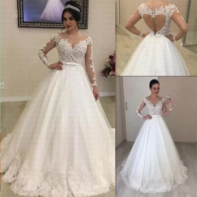 Vestidos de novia blancos con apliques de encaje cuello en V línea A espalda abierta mangas largas vestidos Foto 1 de 4
