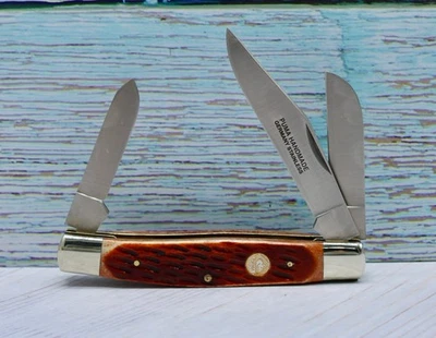 CUCHILLO PUMA HECHO A MANO ALEMANIA ACERO INOXIDABLE #480675 3 HOJAS HUESO ÁMBAR GANADERO Foto 1 de 4