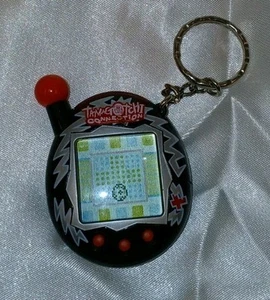 Tamagotchi Connection 2004 v4 Black Silver Lightning Bandai usato funzionante - Foto 1 di 2