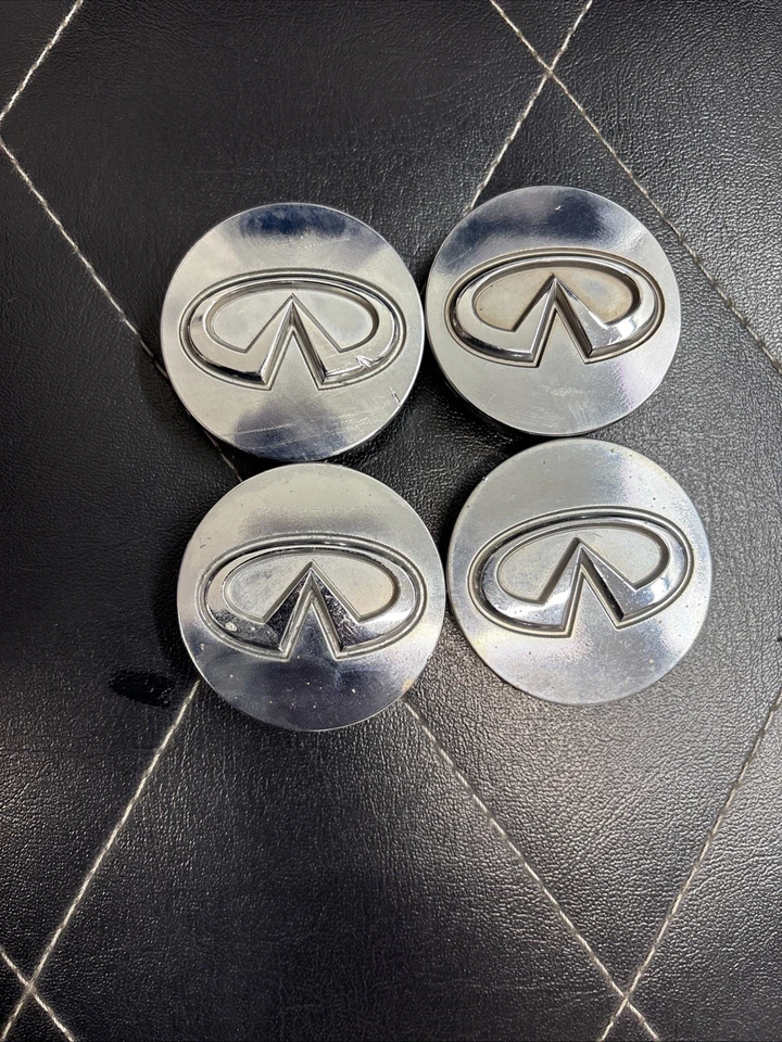 4 tapas centrales de llantas genuinas OEM INFINITI G35 M35 G37 Q60 Foto 1 de 4