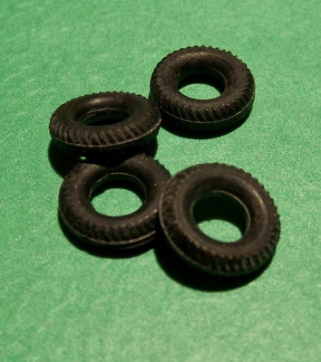 4 CORGI TOYS round TREAD TIRES for 1968 James Bond 007 Aston Martin #261  - Image 1 of 2