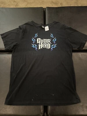 CAMISETA DE COLECCIÓN 2009 GUITAR HERO NEGRA PÚRPURA AZUL LLAMAS TALLA L Foto 1 de 4