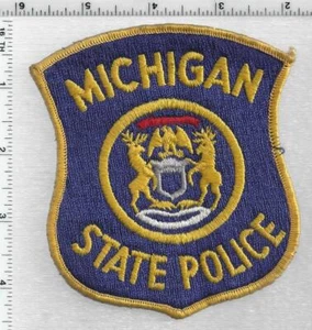Parche de hombro uniforme de despegue de primera edición de la policía estatal (Michigan) - Imagen 1 de 1