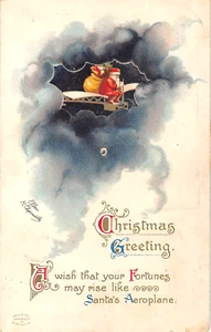 1916 sgd. Clapsaddle mechanischer Weihnachtsmann & Spielzeug im Flugzeug Weihnachtspostkarte - Bild 1 von 2
