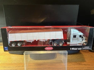 NEW RAY LONG HAUL TRUCKER SILVER PETERBILT 387 LOWBOY GRAIN HAULER 1/43 NIB RARE - Picture 1 of 11