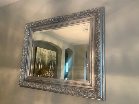 large ornate wall mirror Cover