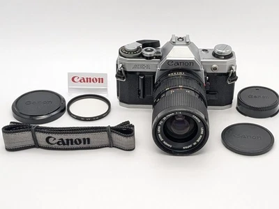 🎦 Medidor OK [N COMO NUEVO+] Cámara fotográfica Canon AE-1 plateada SLR + NFD 35-70 mm de Japón Foto 1 de 4