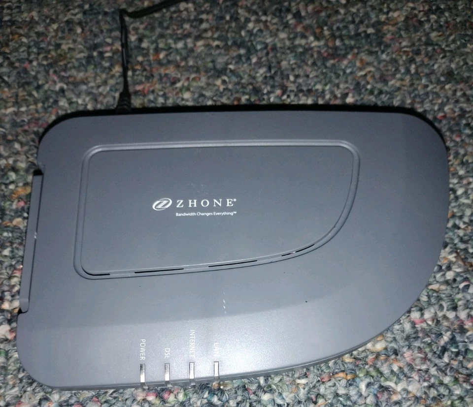 ​Módem router iPhone 6511-A1-NA puente DSL de un solo puerto con adaptador de alimentación probado Foto 1 de 4