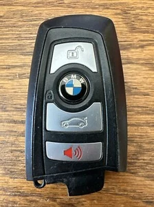 OEM BMW SEDAN SMART KEY REMOTE FOB FCC: YGOHUF5662 4-BUTTON GOOD! - Picture 1 of 6