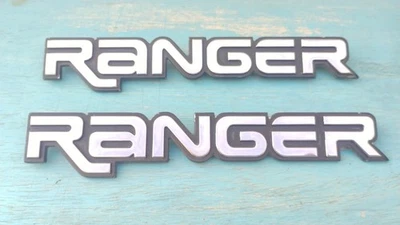 98 99 00 01 02 03 04 05 FORD RANGER GUARDABARROS LATERAL EMBLEMA LOGOTIPO CONJUNTO INSIGNIA OEM (2005) Foto 1 de 4