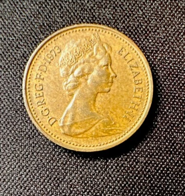 UNITED KINGDOM 🇬🇧 ONE (1) NEW PENNY COIN 1973 (QUEEN ELIZABETH II) - Image 1 of 2