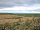 Photo 12x8 Undulating fields at harvest time Dally Far out, over the sea,  c2009