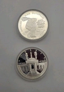 1983 & 1984 One Dollar Commerative LA Olympic Proof Silver Coins.Lot Of 2.UNC - Picture 1 of 3