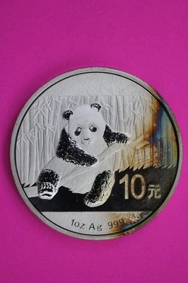 Toned 2014 Gem BU China Panda 1 OZ 999 Silver Coin Guaranteed Authentic 1711 - Image 1 of 3