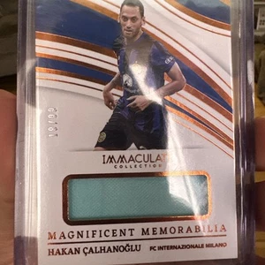 2023-24 Panini Immaculate Collection Magnificent Mem.  Hakan Calhanoglu /99 - Bild 1 von 2