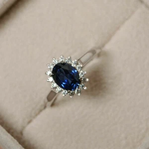 Anillo de compromiso con halo de oro blanco de 14 quilates de zafiro azul de ... - Imagen 1 de 3