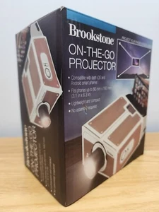 Brookstone On-the-go Projector for use with both iOS and Android Smart Phones  - Picture 1 of 7
