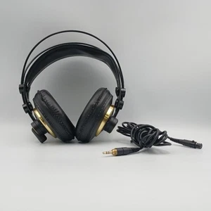 Auriculares profesionales AKG K240 Studio 55 ohmios con cable negros y dorados sobre la oreja - Imagen 1 de 7