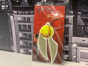 🟢 Harry Potter Keyring Quidditch Golden Snitch Rubber Official Merchandise - Picture 1 of 4