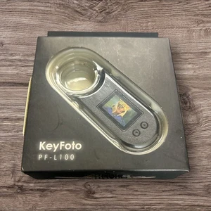 Mustek KeyFoto PF-L100 Key Chain Photo Viewer 1' OLED Screen 42 Pics New - Picture 1 of 4