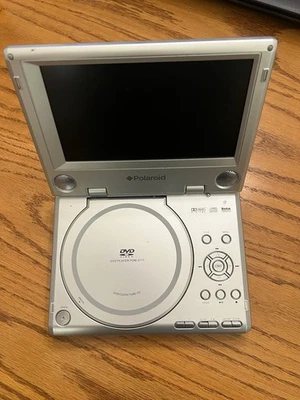 Reproductor de DVD portátil Polaroid PDM-0711 (7") + manual + batería - sin cables sin probar Foto 1 de 4