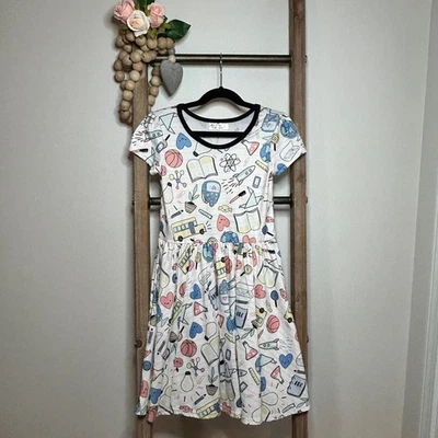 Lindo Vestido Punto Sonrisa Niñas Talla 7 Material Escolar Estampado Manga Corta Foto 1 de 4