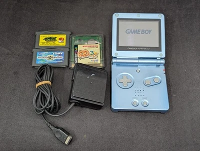 L4291 Nintendo Gameboy Advance SP console Pearl Blue Japan GBA w/game adapter - Image 1 of 4