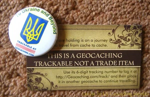 To Ukraine & Beyond - Geocaching rastreable para su lanzamiento en Canadá (blanco) - Imagen 1 de 6