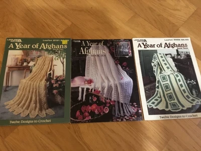 Lot of 3 A year in Afghan Crochet Pattern Books Leisure Arts - Image 1 of 4