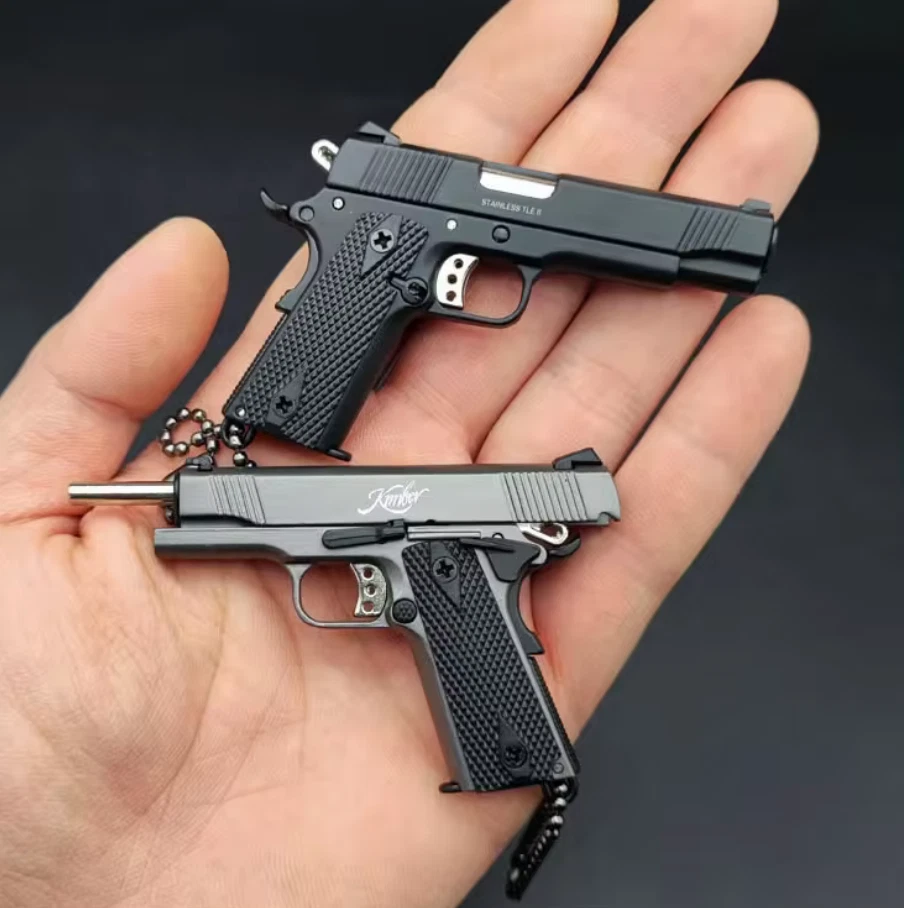 Mini Gun Keyrings x2 ✅ 2x Kimber 1911 key chains ✅ 1 Silver and 1 Black Model  - Image 1 of 4
