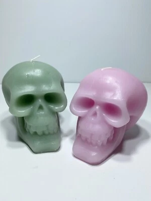 Vela cabeça de caveira Halloween rosa pastel e azul-petróleo/verde claro Dia De Los Muertos - Imagem 1 de 4