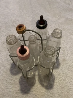 7 biberones vintage para muñecas Evenflo 2 con pezones y biberón con cesta de metal Foto 1 de 3