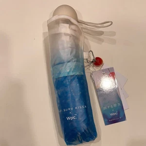 Nuevo Paraguas de Vinilo Plegable Japón Wpc × Tabi Suru Kissa Azul Crema Soda Regalo Raro - Imagen 1 de 8