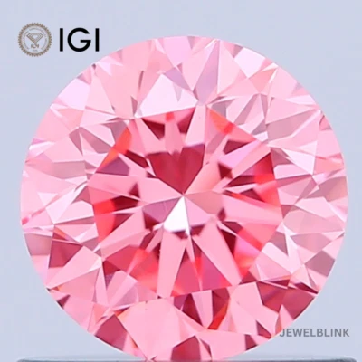 IGI Certified 0.69 Carat Fancy Vivid Pink VVS2 Round Cut CVD Lab Grown Diamond - Image 1 of 4