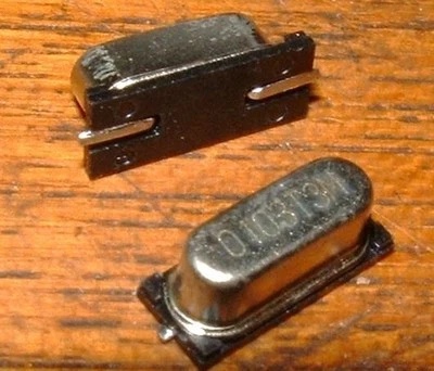 strip of 20 Toyocom 197S0103  20Mhz surface mount crystal 20 Mhz 0103T3M - Image 1 of 3