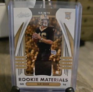 2021 Absolute Football Rookie Materials Ian Book Jersey Patch #ARM-IBO - Picture 1 of 2