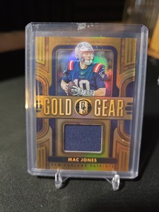 2023 Panini Gold Standard MAC JONES Gold Gear jersey #/299 New England Patriots