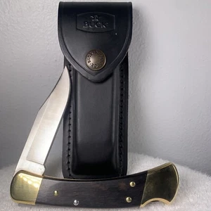 Buck® 110 Folding Hunter Lock-back Knife, Brass Bolster with Leather Sheath - Picture 1 of 8