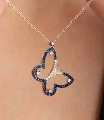 Colgante con dije de mariposa de zafiro simulado de corte redondo de 2 quilates enchapado en oro amarillo de 14 k Foto 1 de 4