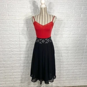 Falda midi Worthington negra semi transparente talla 10 blanca bordada dobladillo con lentejuelas - Imagen 1 de 7