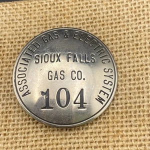 Vintage Sioux Falls Gas Co. employee badge 104, Associated Gas & Electric System - Picture 1 of 8