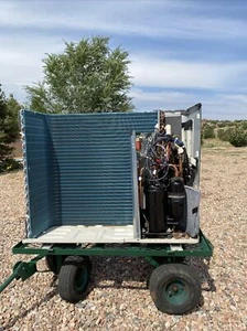 Fujitsu AOU24RLXFZ condenser assembly, coil, compressor, valves, and base - Picture 1 of 7