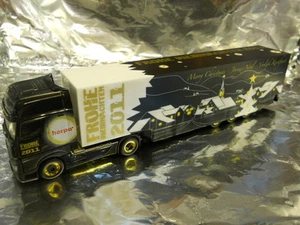 ** Herpa 158992 MB Actros Gigabox Auflieger Herpa Weihnachten 2011 Maßstab 1:87HO - Bild 1 von 1