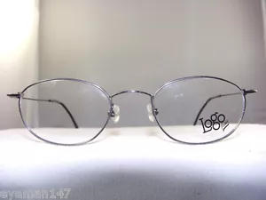 LOGO NX2442 THIN EYEGLASS FRAME IN GUNMETAL SIZE 45-20 - Picture 1 of 3