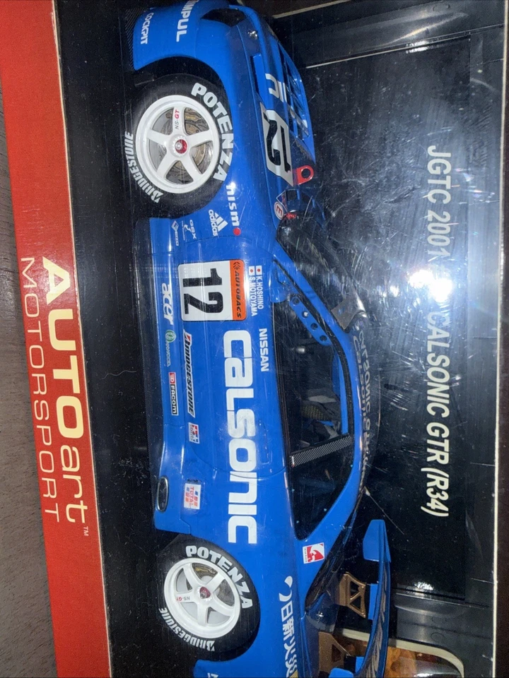 Coche diecast AUTOart 2002 Nissan Skyline R34 GTR #12 Calsonic JGTC 1:18 Foto 1 de 4