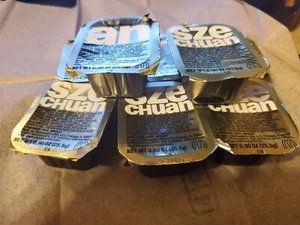 (8) 2022 McDonalds Szechuan Sauce Packets In Hand W/ FREE SHIPPING! RICK & MORTY - Picture 1 of 1