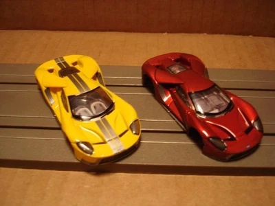 2 AFX RACING H.O. SOLO CARROCERÍAS SLOT ESCALA FORD GT TRIPLE AMARILLO Y ROJO LÍQUIDO Foto 1 de 4