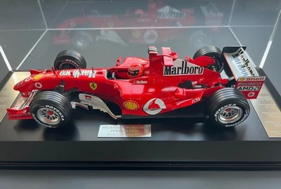MICHAEL SCHUMACHER FERRARI F2004 7 x WORLD CHAMPION 1/18 GPL DISPLAY CASE - Image 1 of 4