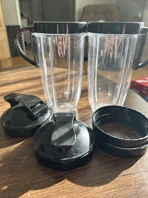 Batidora Nutribullet vasos de repuesto con tapas y anillos adecuados. NUEVO Foto 1 de 3